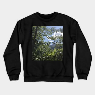 Peeking through trees at Glacier National Park Crewneck Sweatshirt